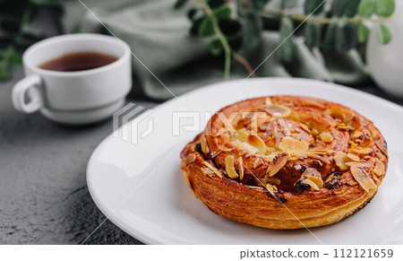 Delicious homemade bakery with almonds and raisins 112121659