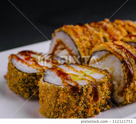 Tempura Maki Sushi on white plate Tempura Maki Sushi on white plate 112121751