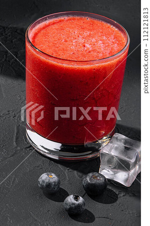 Strawberry smoothie on stone 112121813