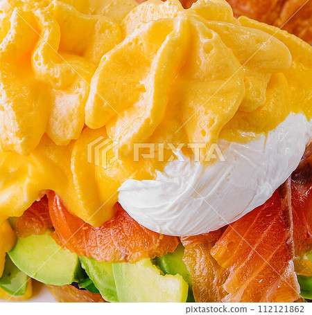 fresh croissant with smoked salmon close up macro fresh croissant with smoked salmon close up macro 112121862