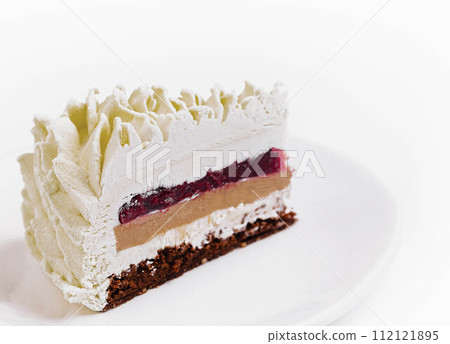 Layered Mousse Cake on plate isolated 112121895