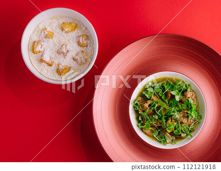 soup with beef and herbs and croutons 112121918