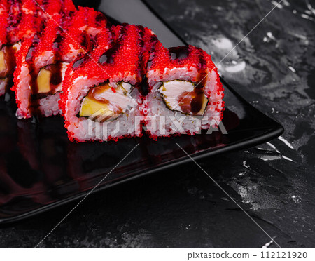 Sushi Roll California on black stone plate 112121920