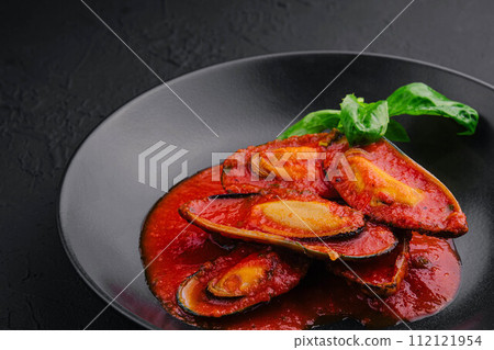 Cooked Mussels with hot spiced sauce Cooked Mussels with hot spiced sauce 112121954