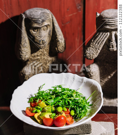 Fresh salad with avocado, cherry tomatoes and arugula Fresh salad with avocado, cherry tomatoes and arugula 112122388