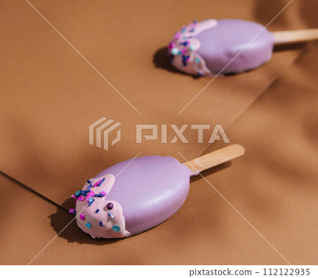 popsicle ice cream in purple glaze popsicle ice cream in purple glaze 112122935