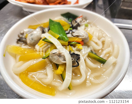 Korean seafood noodles soup. kalguksu (handmade) chopped noodles 112123154