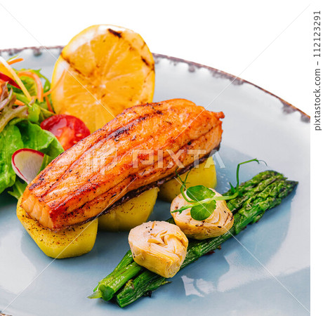 salmon with asparagus and artichoke isolated on white salmon with asparagus and artichoke isolated on white 112123291