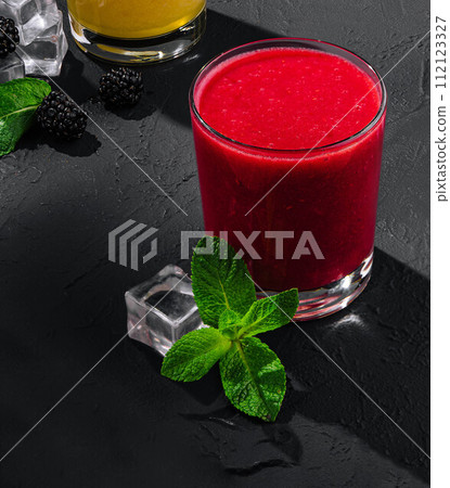 Strawberry smoothies on stone close up Strawberry smoothies on stone close up 112123327