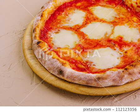 Traditional Neapolitan Pizza on wooden board 112123356