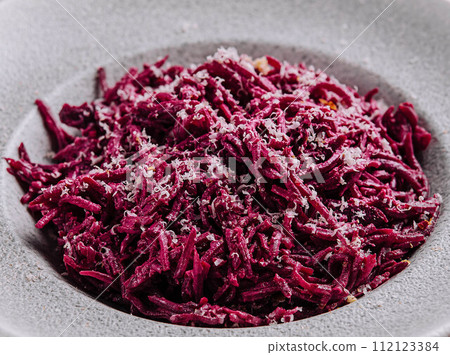 Beetroot salad in bowl top view 112123384