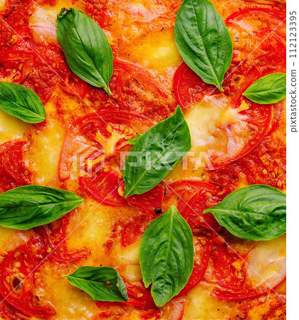 Pizza Margherita close up or macro background 112123395
