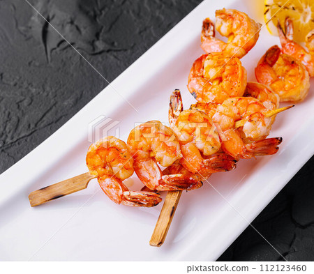 Grilled Shrimp Scampi Skewers with lemon 112123460