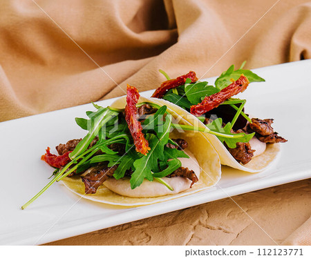 pita with avocado puree and shrimp 112123771
