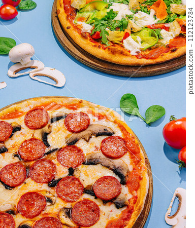 Fresh tasty pizzas on top view 112123784