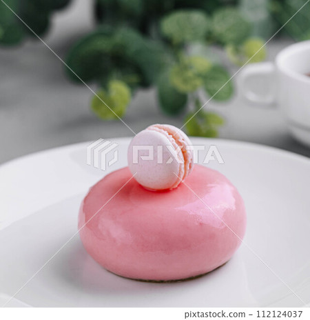 Pink mousse cake decorated close up Pink mousse cake decorated close up 112124037