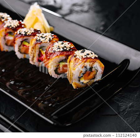 Traditional canada sushi roll on plate 112124140