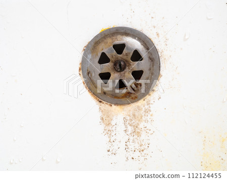 Rusty drain overflowing for the bathroom. Mold on bathroom faucet. Old plumbing. Requires replacement. 112124455