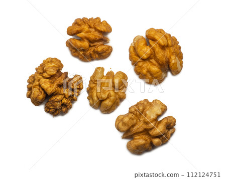 Half of the walnut kernels. Walnut insides. Healthy diet. Ingredients for meals. Walnut stuffing isolate. Half of the walnut kernels. Walnut insides. Healthy diet. Ingredients for meals. Walnut stuffing isolate. 112124751