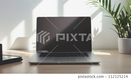 the world of minimalism with a modern laptop, radiating productivity the world of minimalism with a modern laptop, radiating productivity 112125214