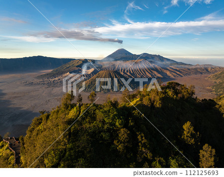 Aerial drone view of Bromo active volcano with Kingkong hill viewpoint, Tengger Semeru national park, East Java, Indonesia 112125693