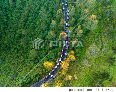 Aerial view of adventure tourist car for mountain Bromo vocalno viewpoint in parking area, Indonesia 112125699