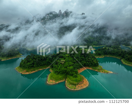 Aerial drone view of island on the lake, tropical Mountain peak , Khao Sok National Park, Thailand 112125700