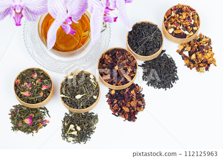 different types of tea on a white background. a kind of delicious fruit tea. 112125963