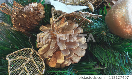 Christmas decorations on the fir tree. Close-up Christmas decorations on the fir tree. Close-up 112127497