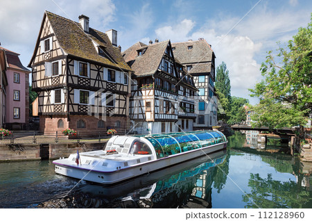 Excursion ship on the river in Strasbourg Excursion ship on the river in Strasbourg 112128960