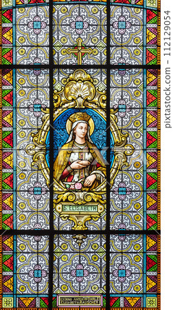 stained glass window on a religious theme 112129054