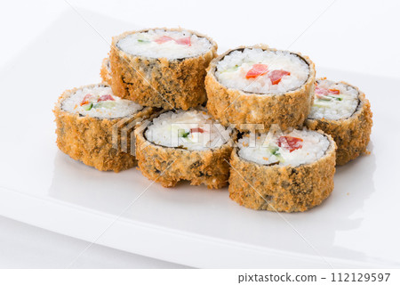 Japanese food restaurant, sushi maki gunkan roll plate or platter set. Sushi set and composition Japanese food restaurant, sushi maki gunkan roll plate or platter set. Sushi set and composition 112129597