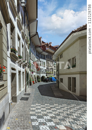 Beautiful street of old town Bern 112129786
