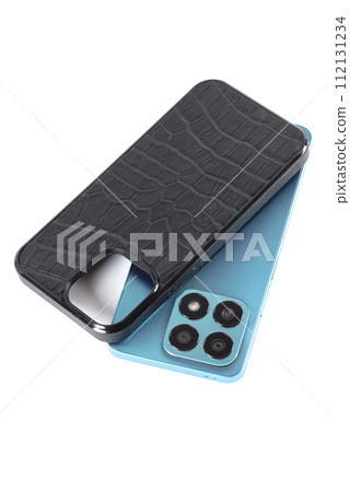 The smartphone case is black crocodile leather on a white background. The smartphone case is black crocodile leather on a white background. 112131234