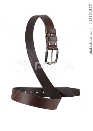 A brown leather belt with a metal buckle is beautifully curved and isolated on a white background. A brown leather belt with a metal buckle is beautifully curved and isolated on a white background. 112131237