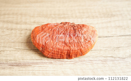 Lingzhi or Reishi mushroom with capsules, organic natural healthy food. 112131822
