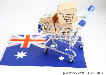 Online shopping, Shopping cart box on Australia flag, import export, finance commerce. Online shopping, Shopping cart box on Australia flag, import export, finance commerce. 112131831