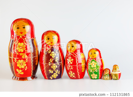 Matryoshka, a Russian wooden doll on a white background Matryoshka, a Russian wooden doll on a white background 112131865