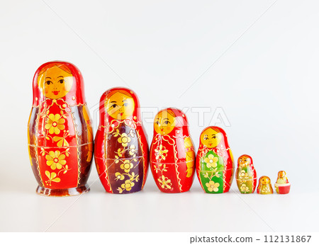Matryoshka, a Russian wooden doll on a white background Matryoshka, a Russian wooden doll on a white background 112131867