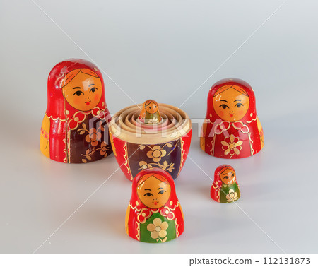 Matryoshka, a Russian wooden doll on a white background Matryoshka, a Russian wooden doll on a white background 112131873