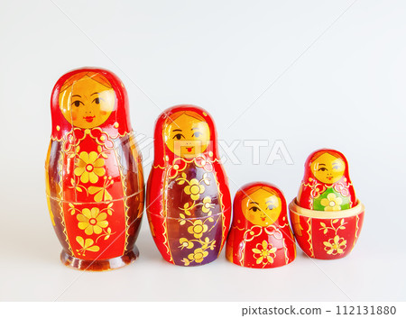 Matryoshka, a Russian wooden doll on a white background Matryoshka, a Russian wooden doll on a white background 112131880