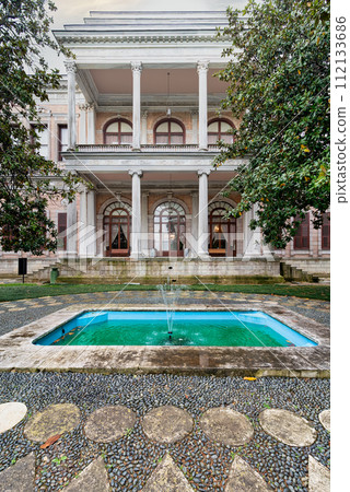 Historic Ottoman 19th century Mecidiye Pavilion, located in Beykoz, Istanbul, Turkey, with a large fountain in front Historic Ottoman 19th century Mecidiye Pavilion, located in Beykoz, Istanbul, Turkey, with a large fountain in front 112133686