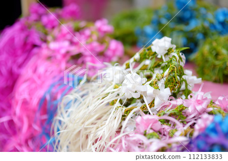 Vrbica orthodox holiday. Small bells, wreaths from willow branches and flowers selling near church. Kids and young girls wearing wreaths. 112133833