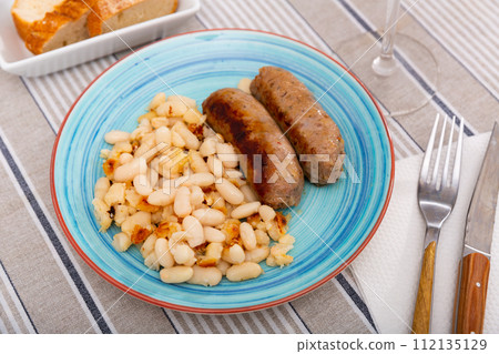 Catalan dish of pork sausage Butifarra and white beans 112135129
