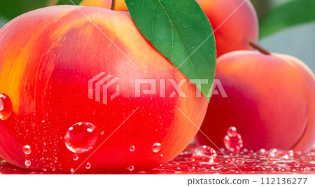 Peach close up with water drops and green leaves. Fresh peaches fruits Peach close up with water drops and green leaves. Fresh peaches fruits 112136277