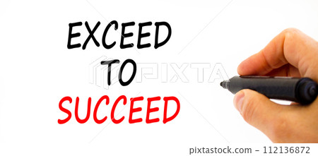 Exceed to succeed symbol. Concept words Exceed to succeed on beautiful white paper. Beautiful white table white background. Businessman hand. Business and exceed to succeed concept. Copy space. Exceed to succeed symbol. Concept words Exceed to succeed on beautiful white paper. Beautiful white table white background. Businessman hand. Business and exceed to succeed concept. Copy space. 112136872
