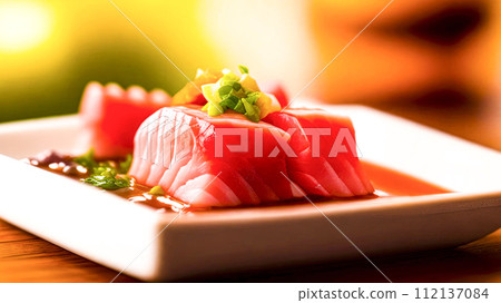 A piece of red fish. The tuna fish is served and looks appetizing. Japanese restaurant concept 112137084