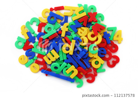 Pile of coloured magnetic letters Pile of coloured magnetic letters 112137578