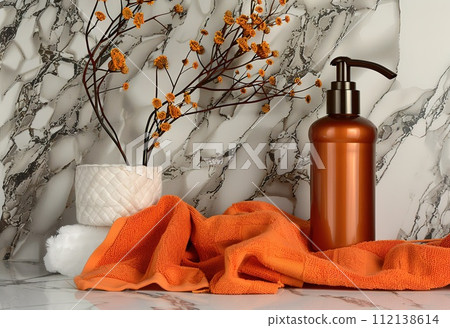 AI-generated content. Elegant bathroom decor with orange accents: soap dispenser, towel and decorative flowers 112138614