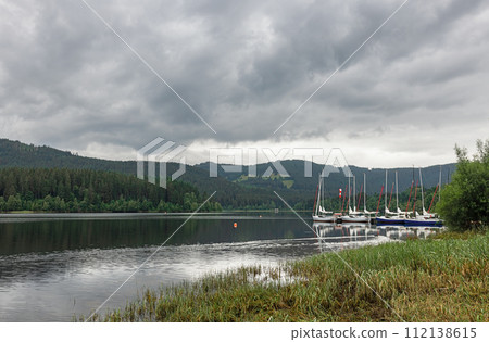 landscape with boats on the lake 112138615